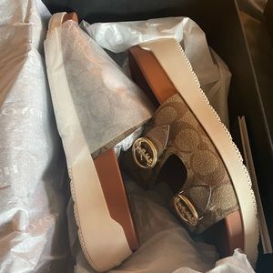 Brand New Coach Sandals - Women’s size 9.